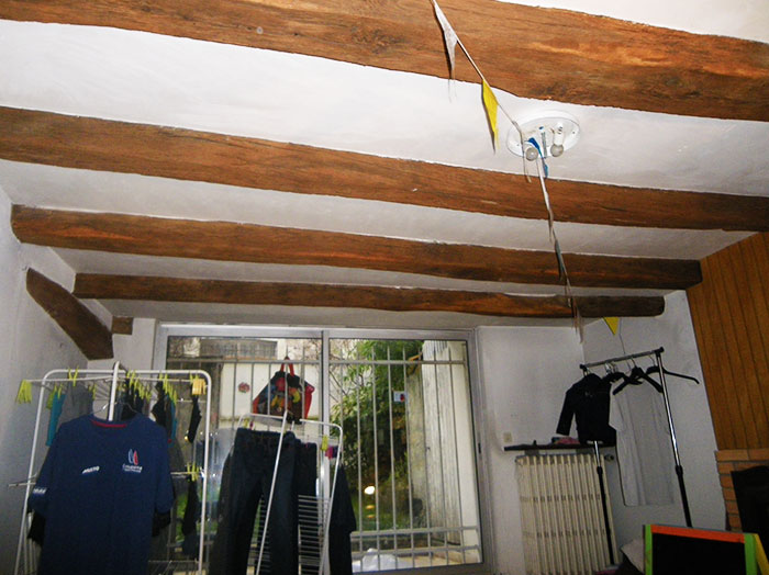 ERMGO Maçonnerie -Dépose dalle béton armé sur plancher bois dans immeuble - Rez-de-chaussée avant travaux